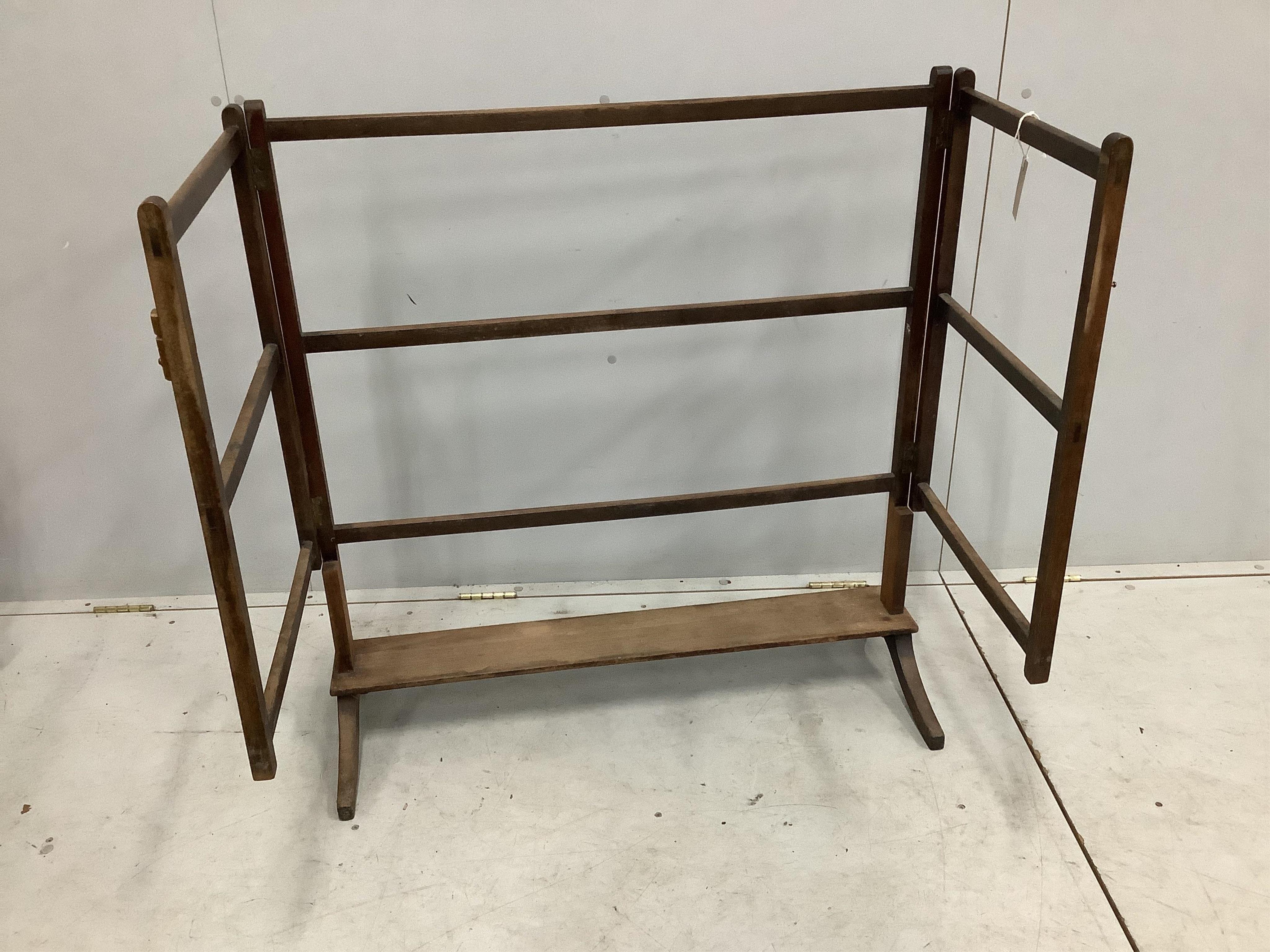 A Victorian bleached mahogany folding towel rail, width 93cm, depth 38cm, height 97cm. Condition - poor